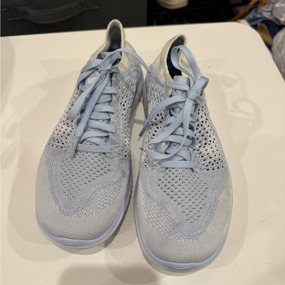 Light blue Nike free-run old style with mesh fabric size 7